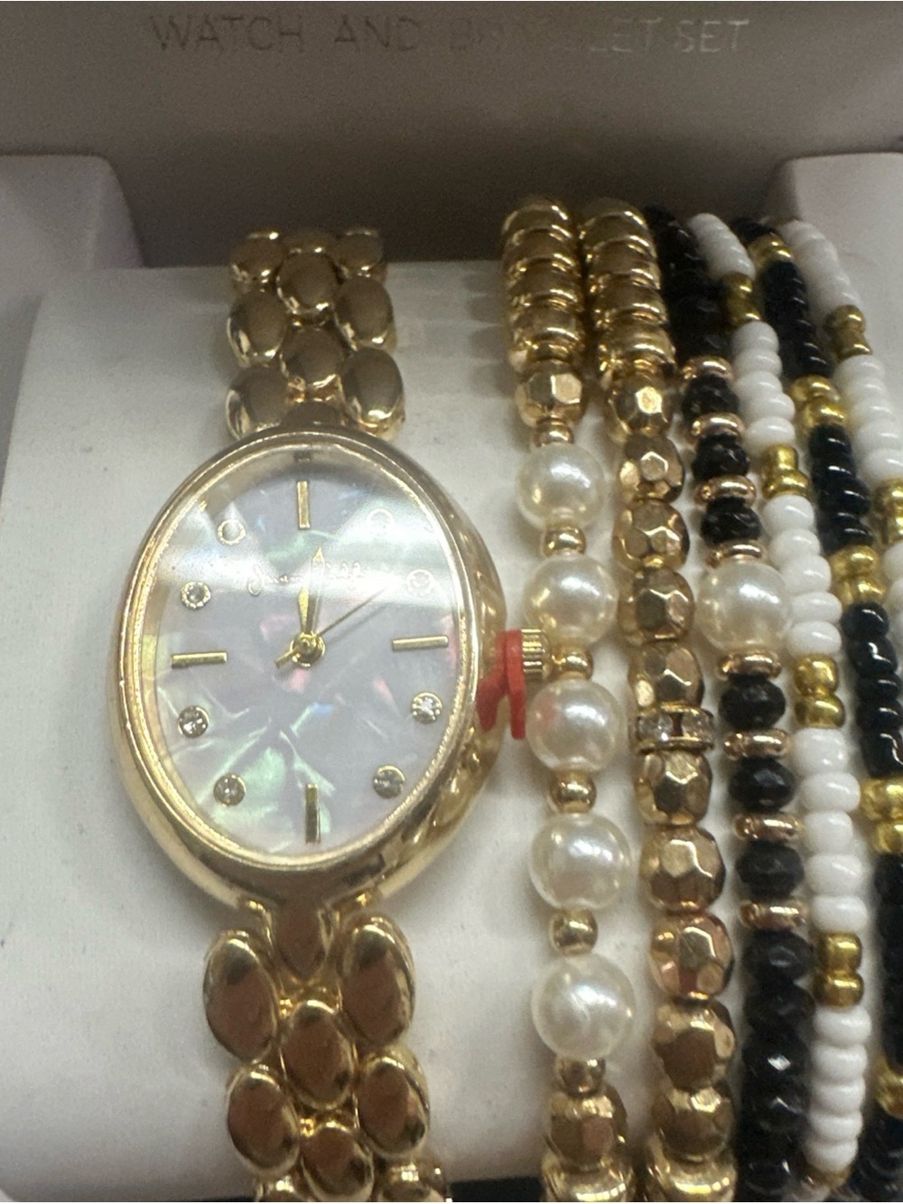 (180Gold-Tone Women's Watch with Mother-of-Pearl Dial and Coordinating Bracelets